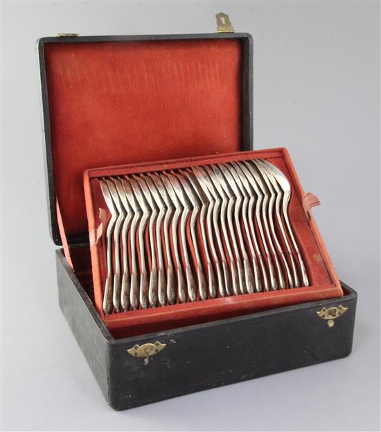 A cased set of late 19th century French 950 standard silver fiddle, thread and shell pattern flatware by Henin & Fils, Paris, 79 oz.